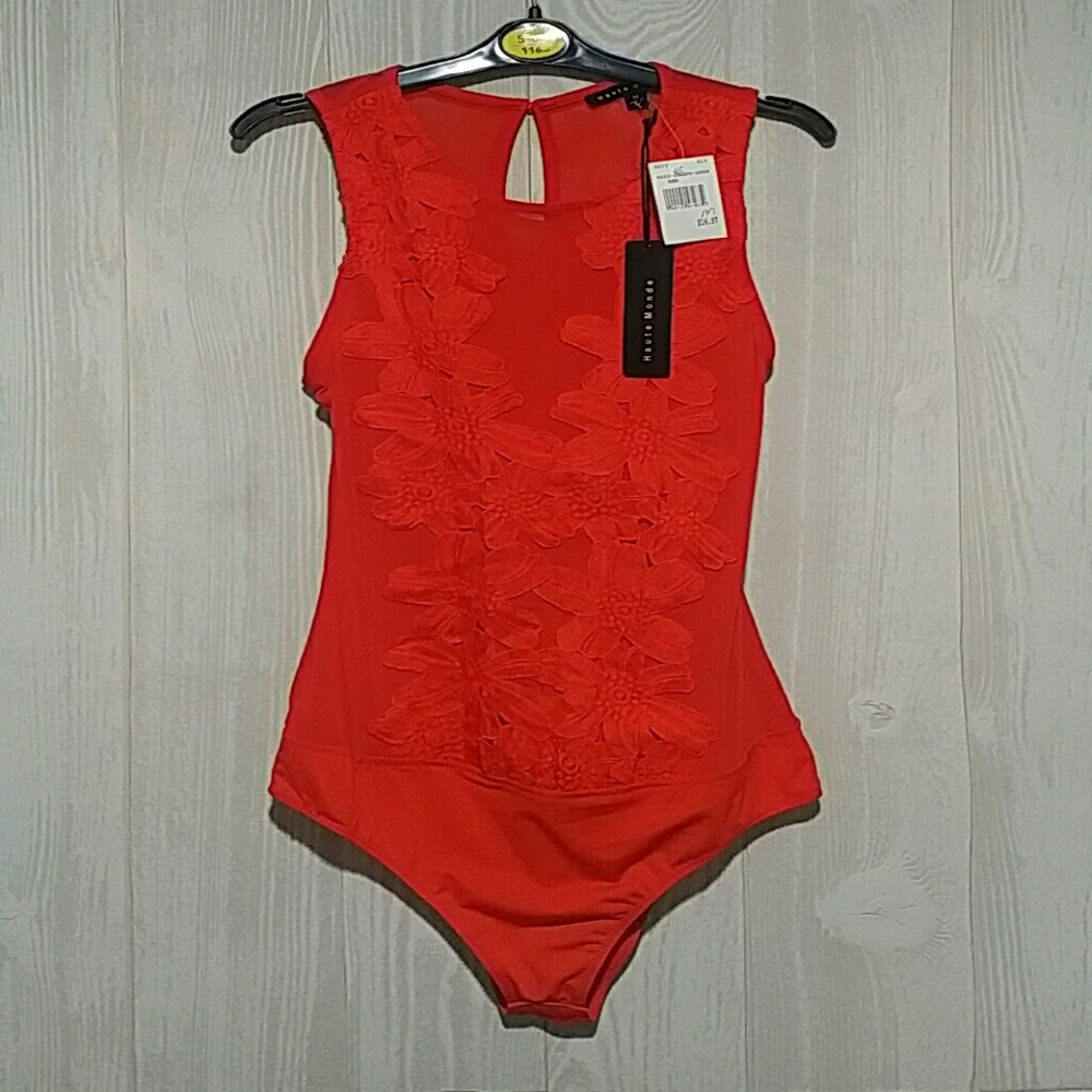 Red sleeveless bodysuit top with textured print